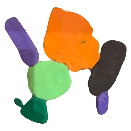 Small sculpture of orange, green, purple and black modelling clay forms