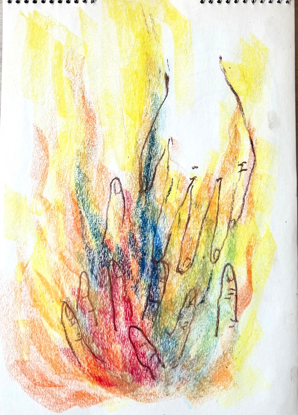 Self-portrait study in oil pastel, upraised hands rising through yellow and orange flame